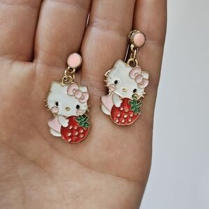 New without tags,  cute hello kitty earrings,  strawberry,  pink,